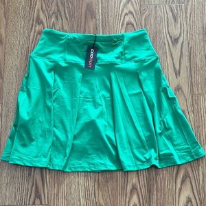 New in pkg, woman’s Cool Run Kelly green tennis skirt.
Size medium.